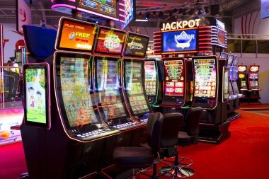 Live dealer Texas Poker table with multiple player seats and community cards visible